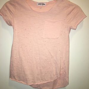 Girls pink size small hole t-shirt
